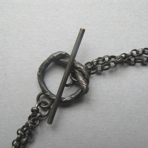 short string neckpiece on oxidised chain